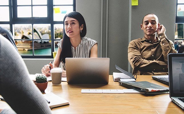 Website professionals in a meeting in a Sydney office