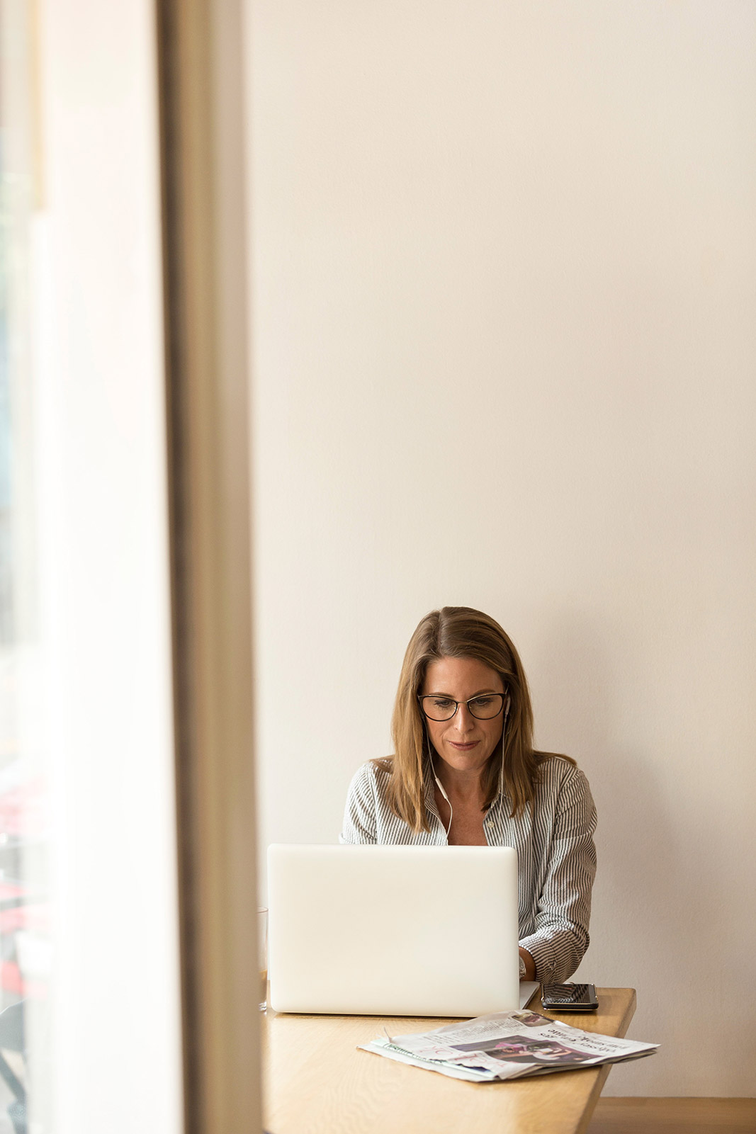 Professional woman working on a project brief for a new website