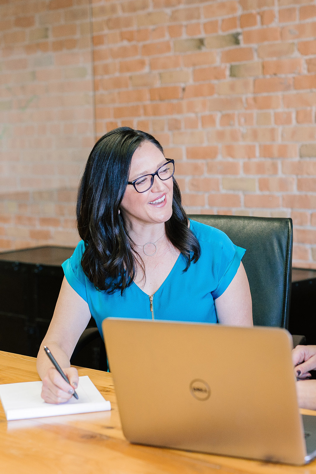 Professional woman working on a website brief