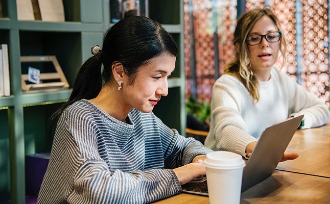 Professionals in Sydney office discussing a business case