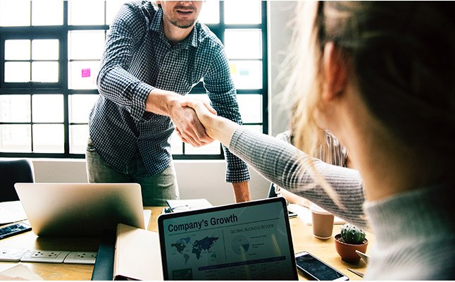 Professionals in Sydney office discussing a business case