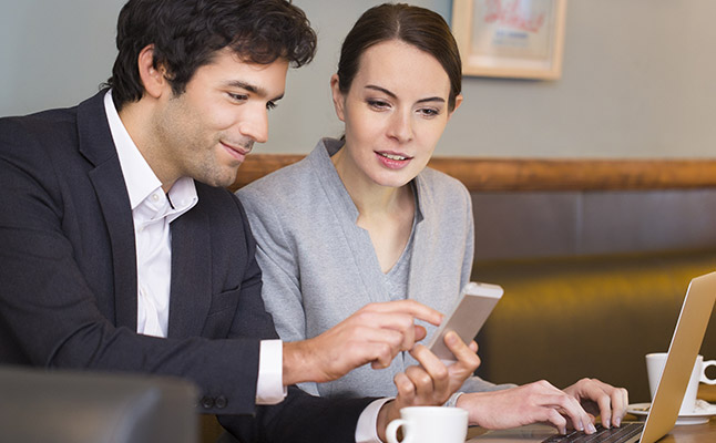 Professionals in Sydney office discussing a business case