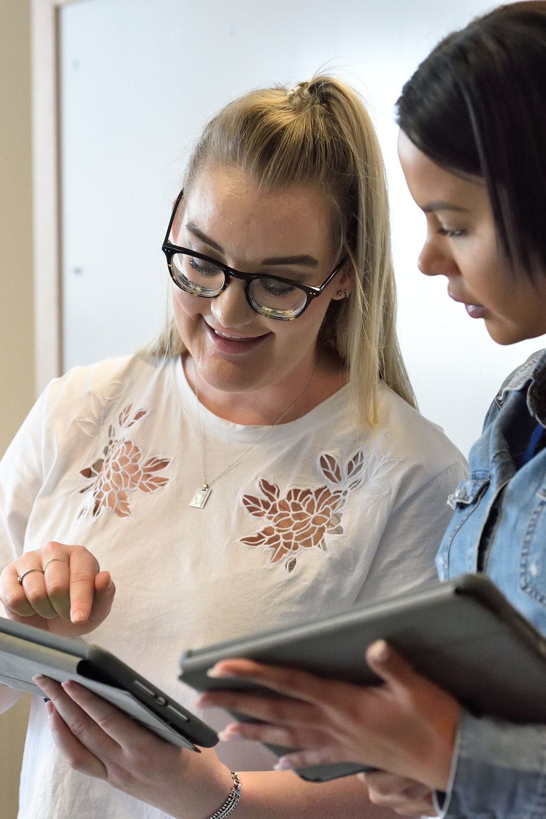 Two government professionals in an office
