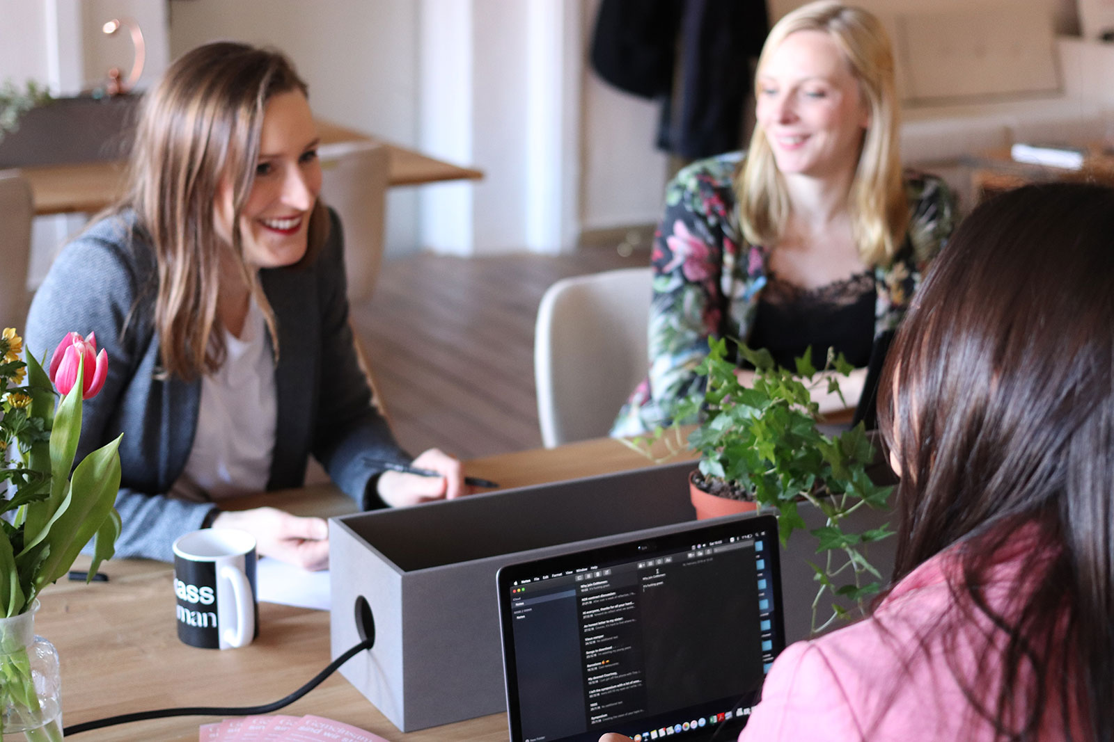 Professionals in a meeting discussing accessibility